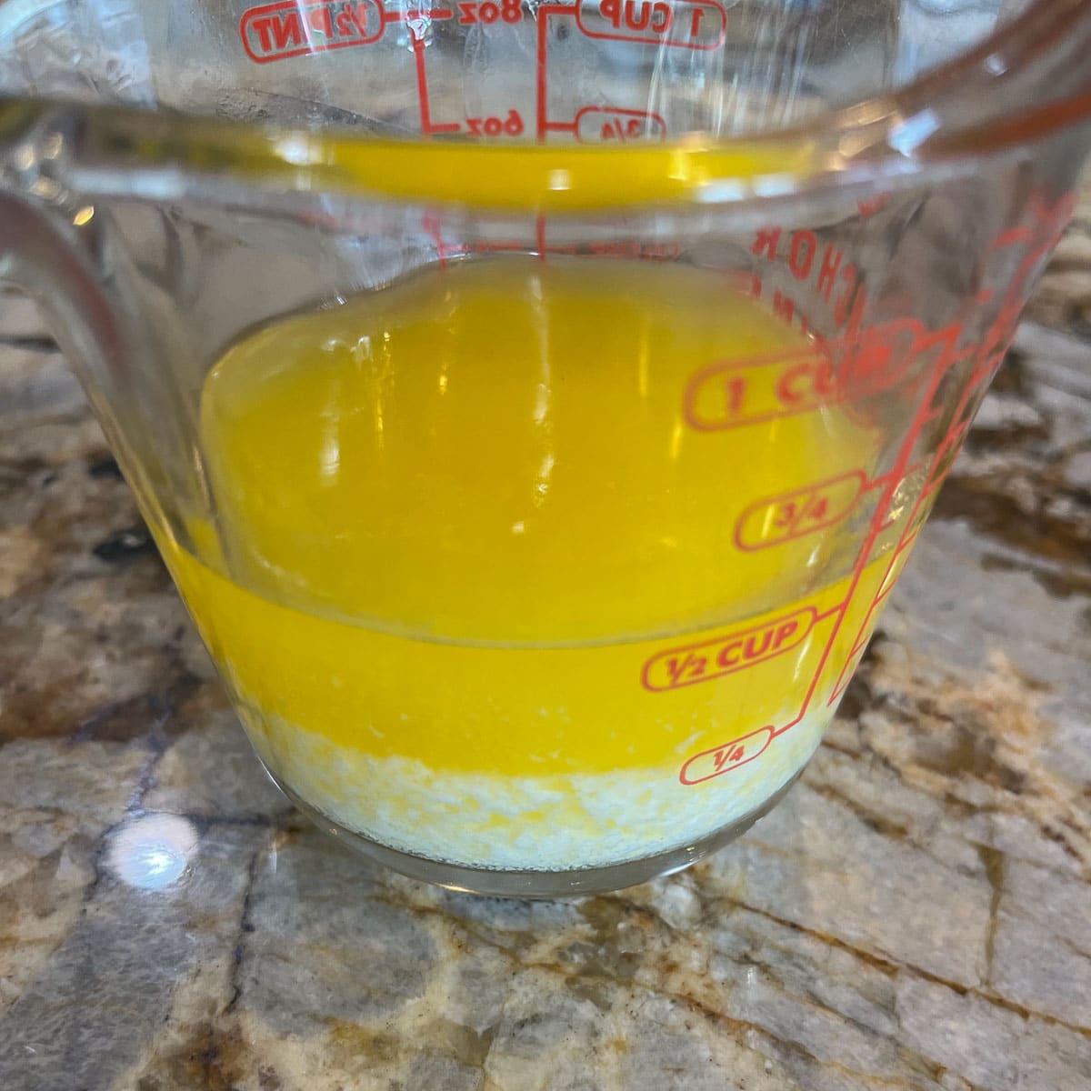 melted butter in a measuring cup