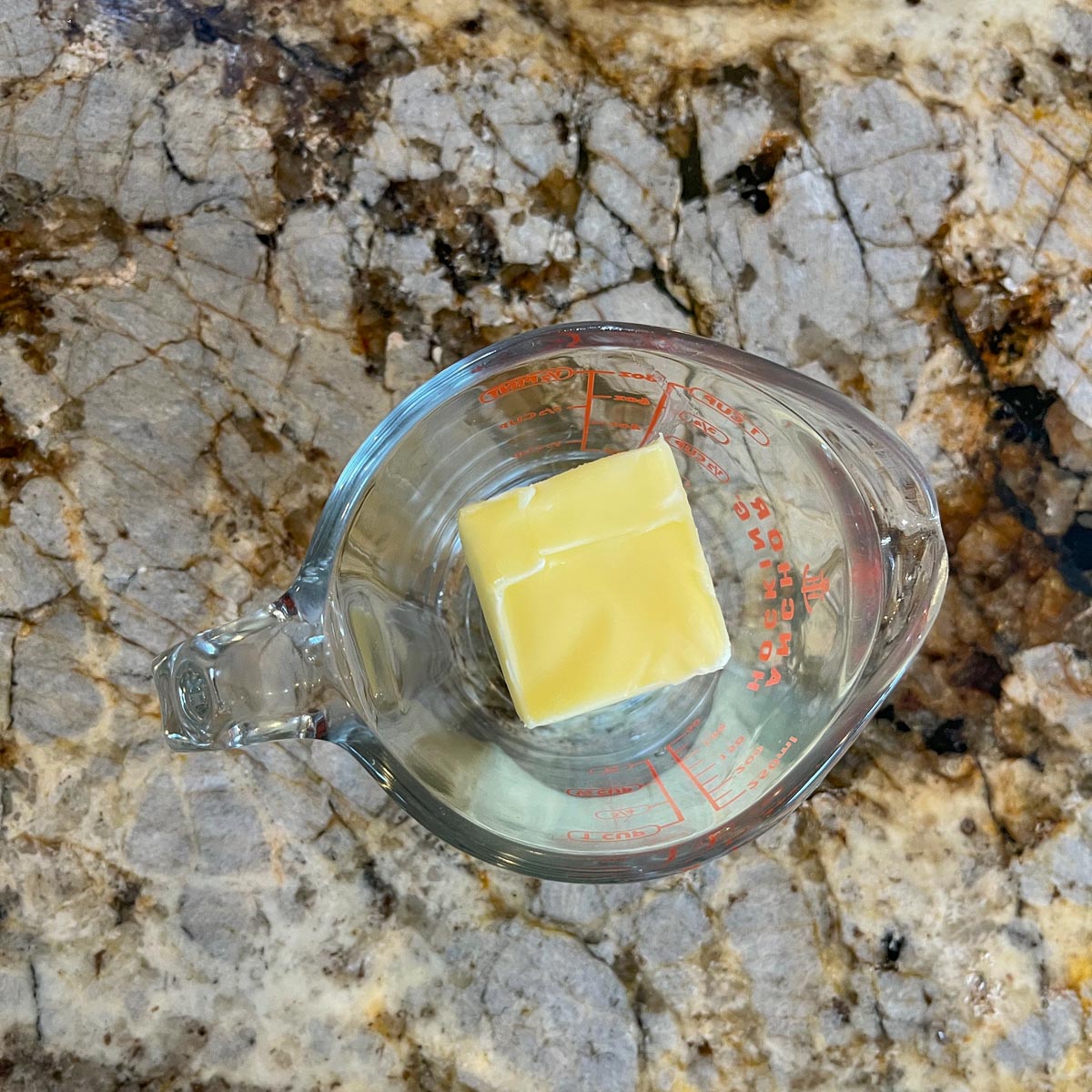 butter in a measuring cup