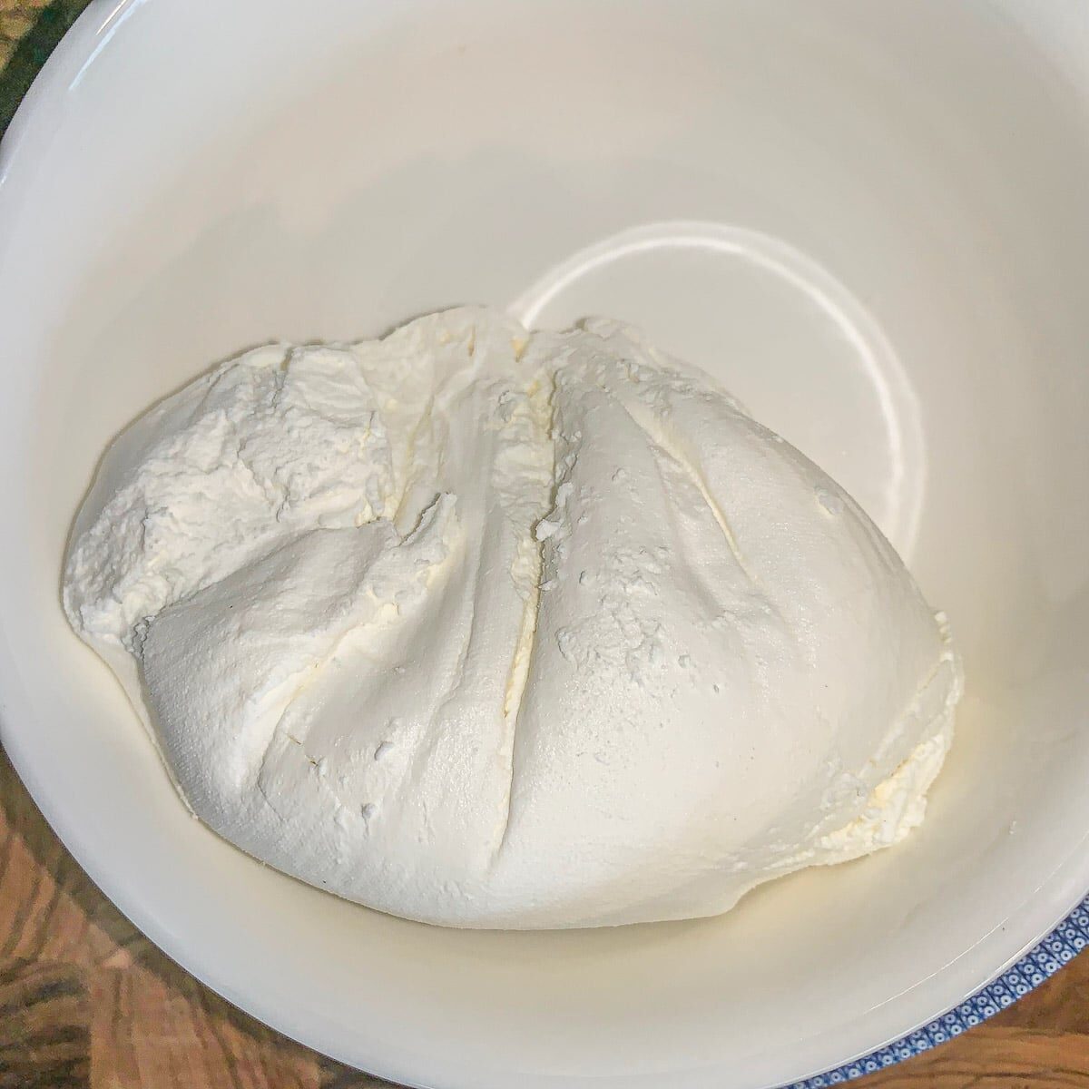greek yogurt cream cheese in a white bowl