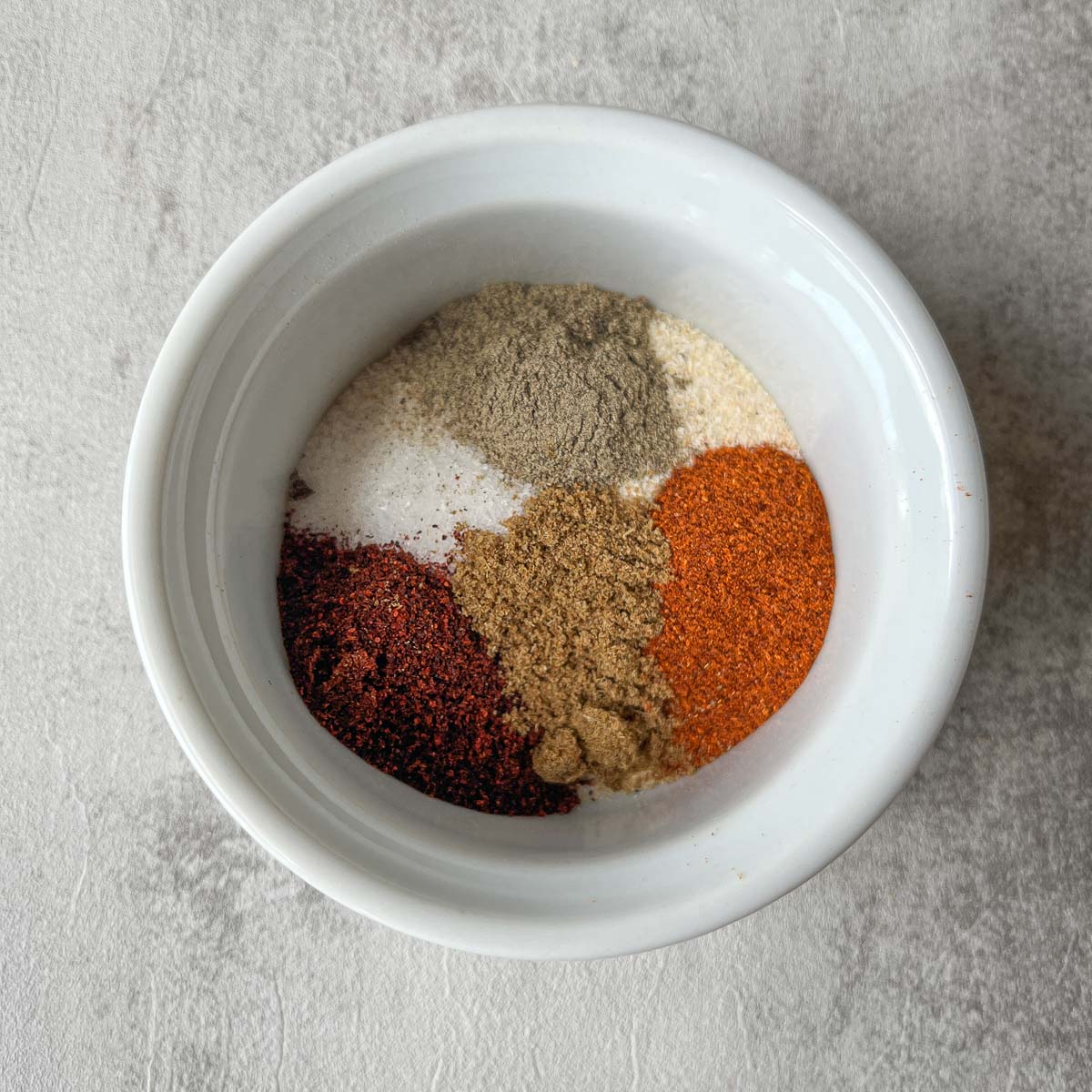 unmixed spices in a small bowl