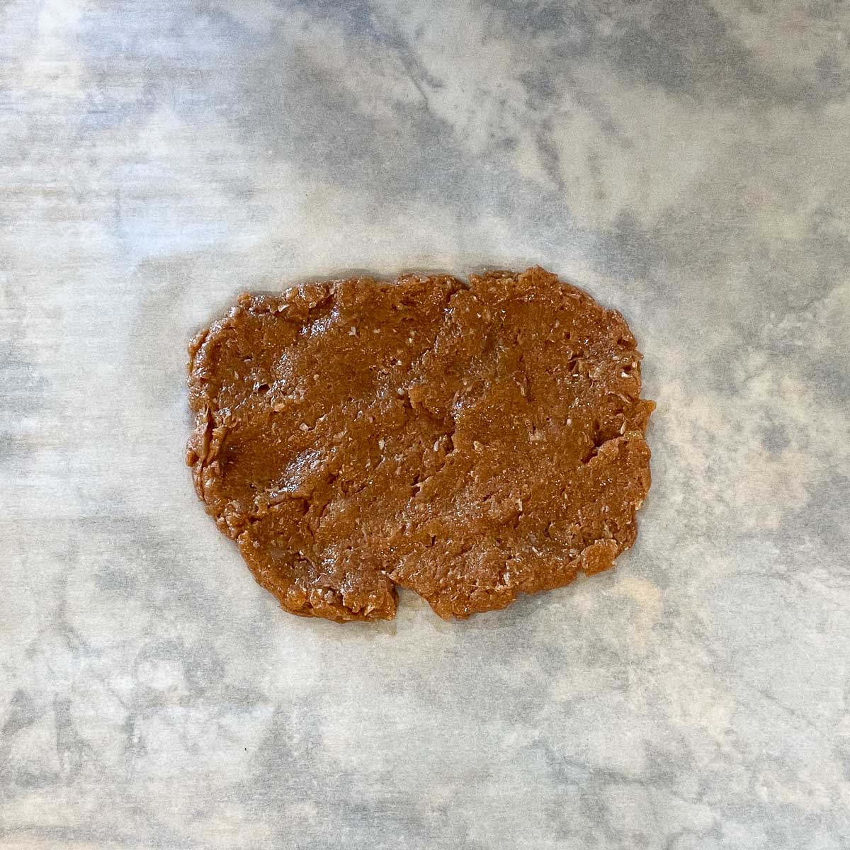 chicken paste placed on parchment paper