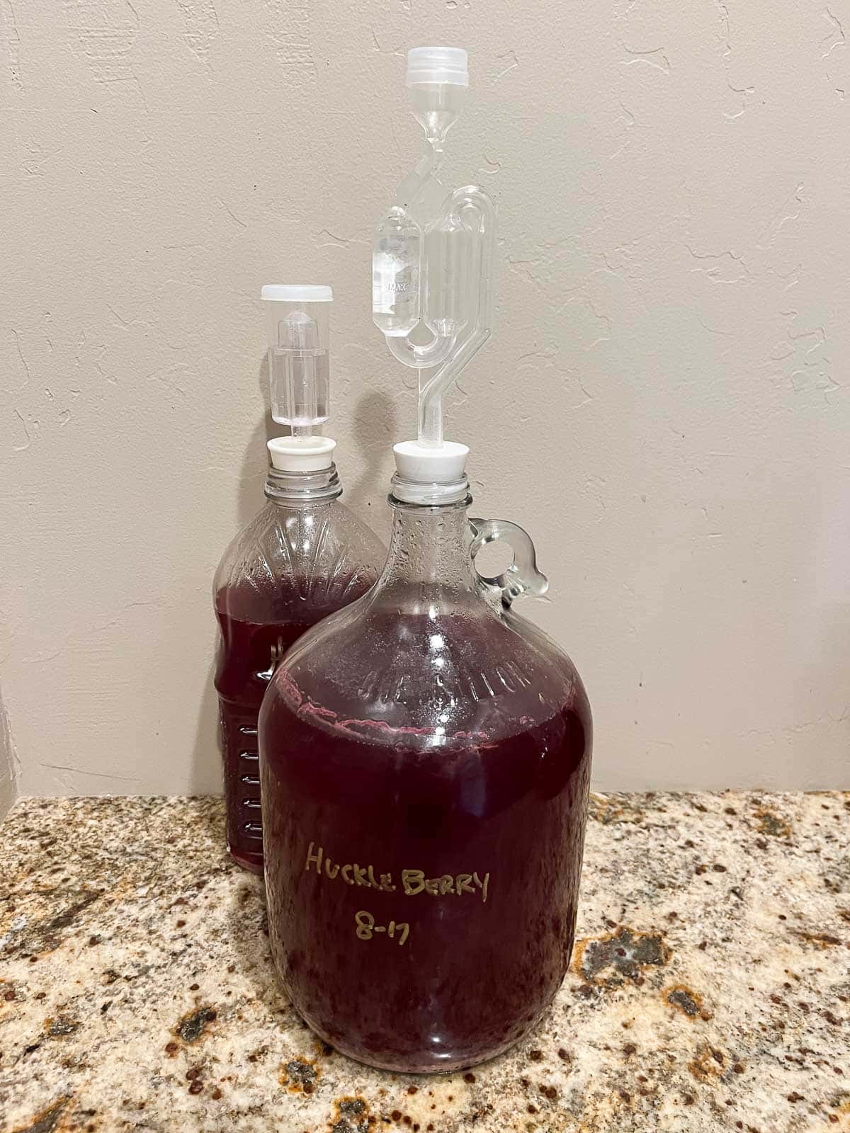 huckleberry wine in carboys fermenting