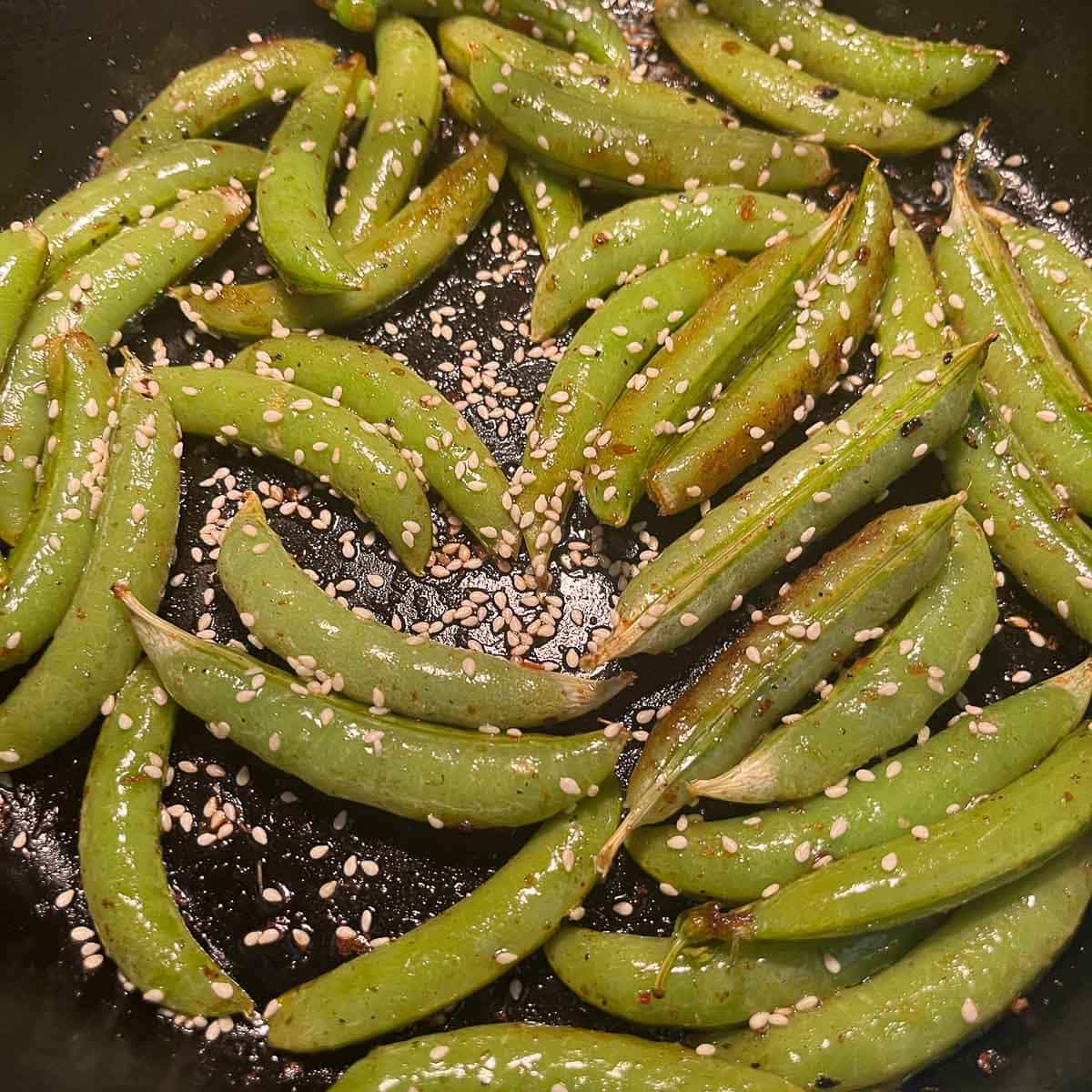 snap peas seasoned with sesame seeds