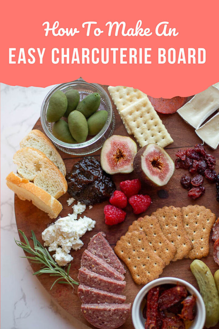 a simple charcuterie board topped with cheese and various items