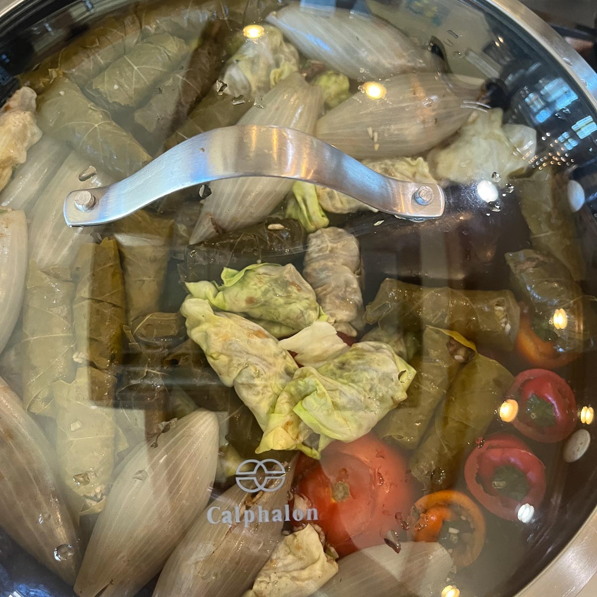 Iraqi Dolma covered with a see through lid, uncooked