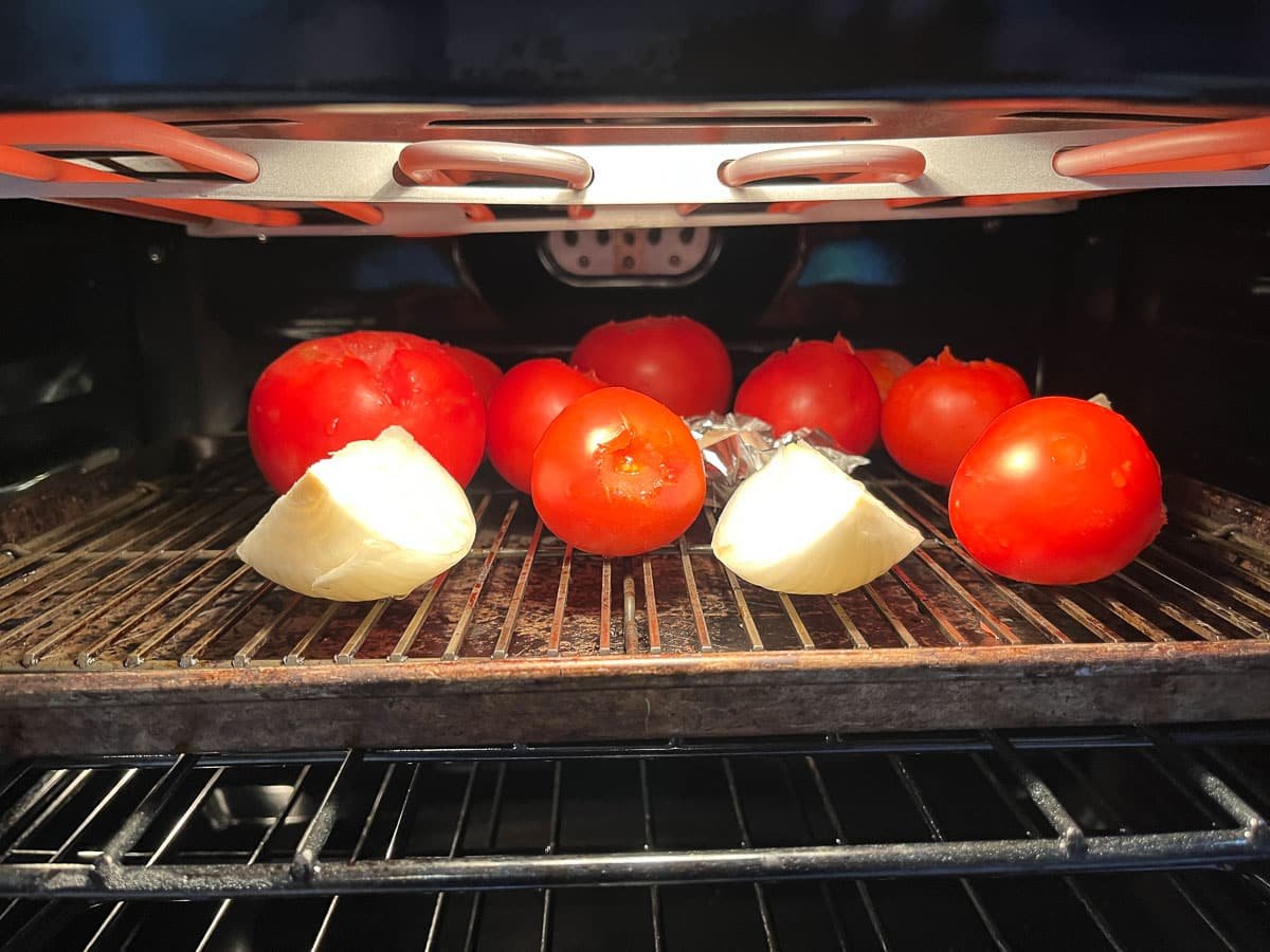 tomatoes and onions being broiled in the oven