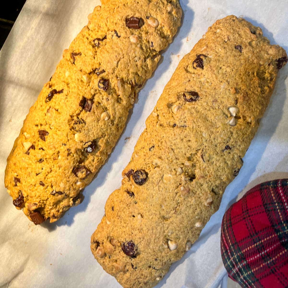 biscotti logs on parchment paper