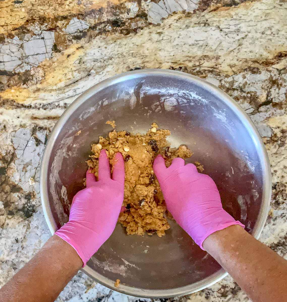 mixing pumpkin spice biscotti dough by hand