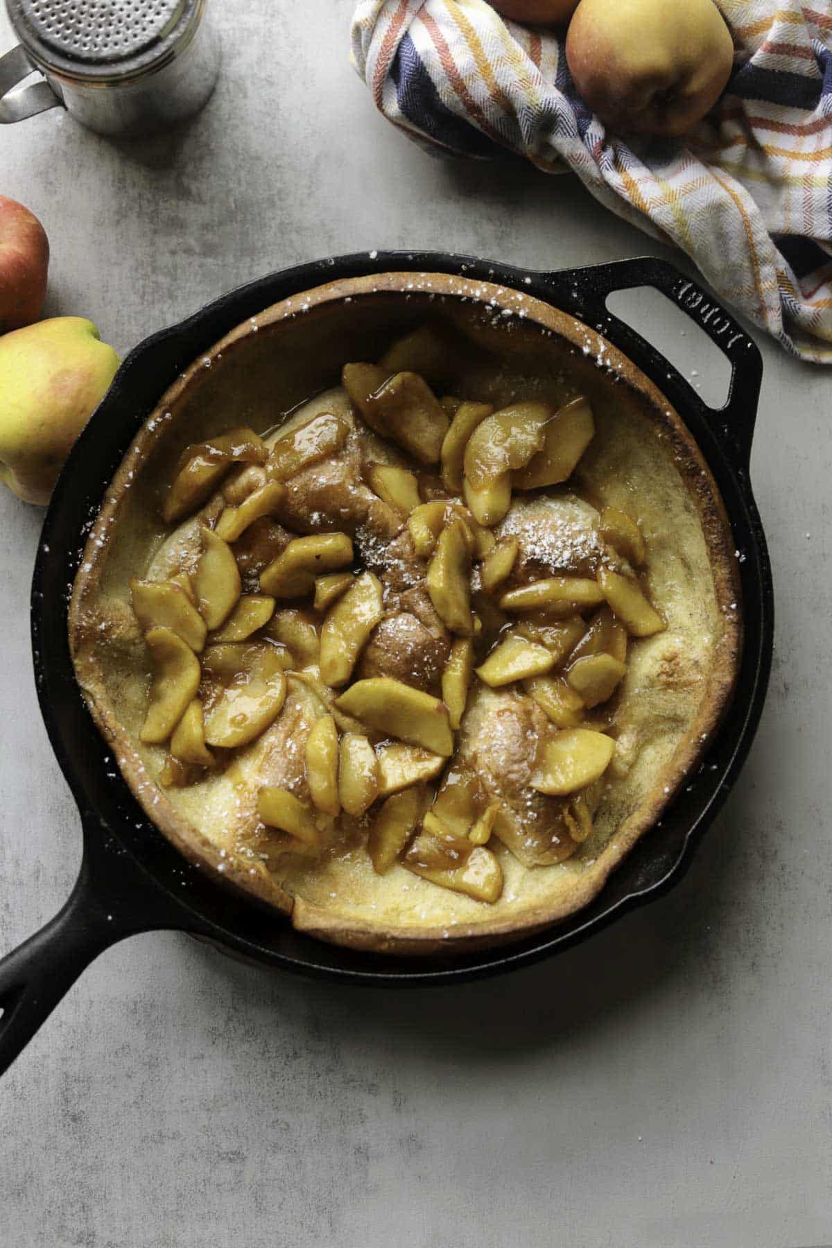 dutch baby with apples around it