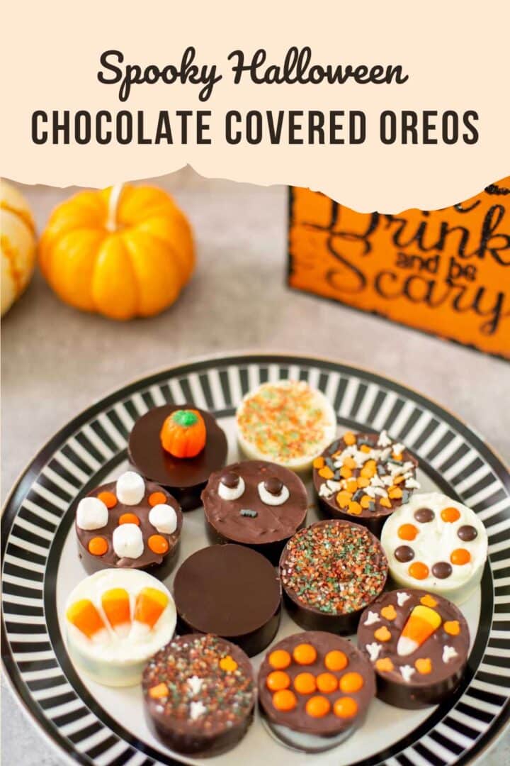 decorated halloween chocolate covered oreos with ghost decoration