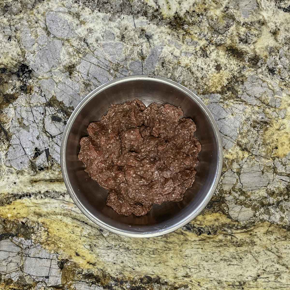 ground beef basterma in a bowl