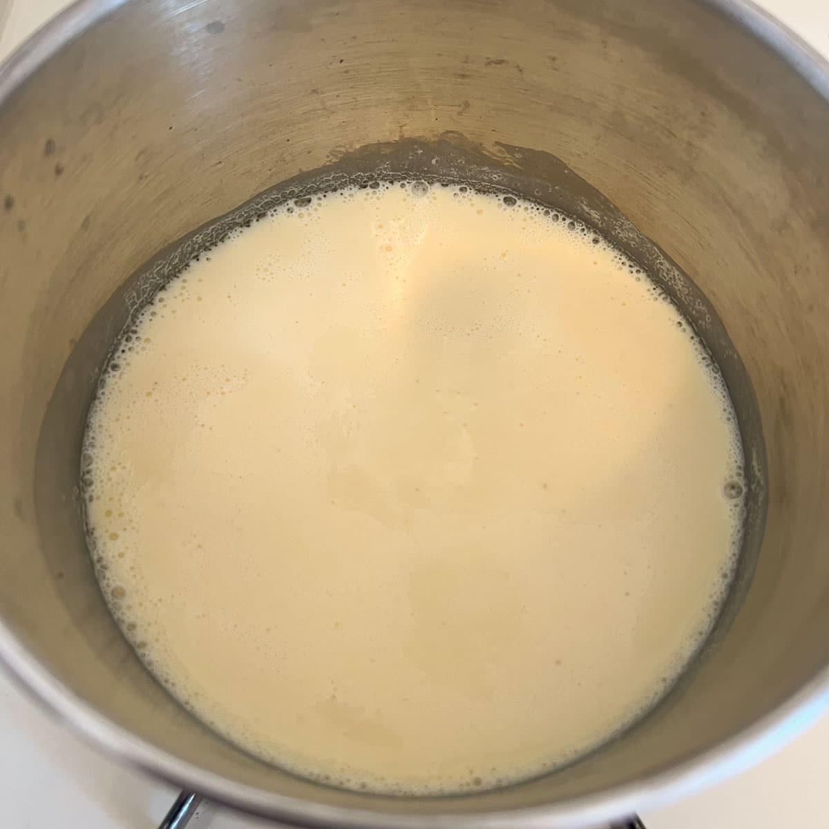 eggnog warming in a saucepan