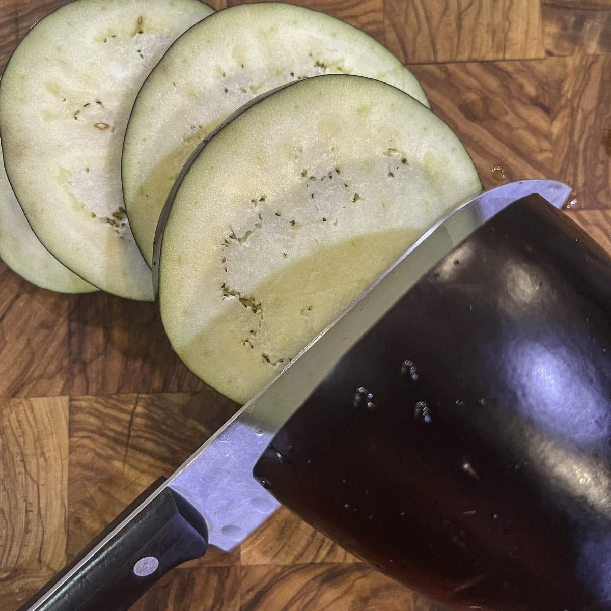 eggplant being sliced