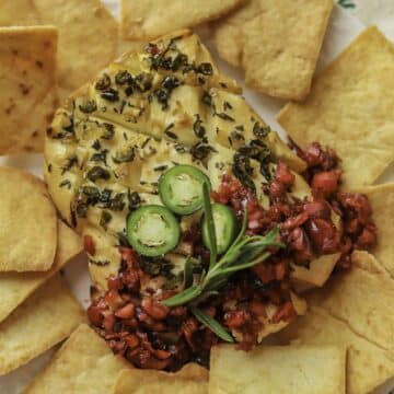 smoked cream cheese topped with cranberry relish and pita chips