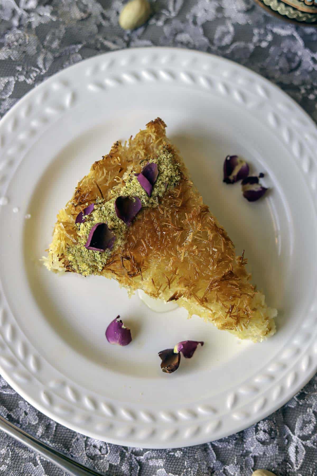 kunafa slice on a white plate