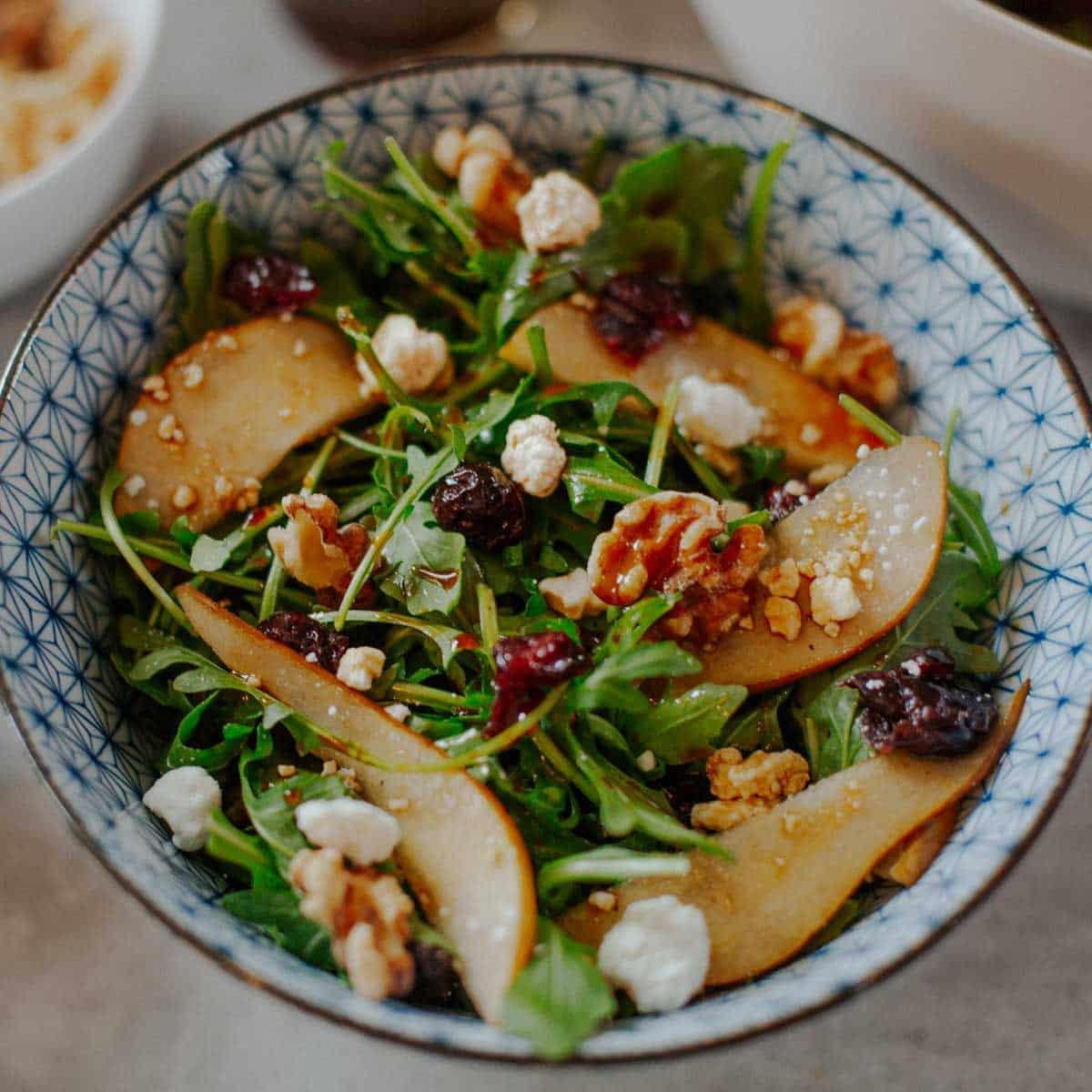 pear goat cheese salad in a bowl