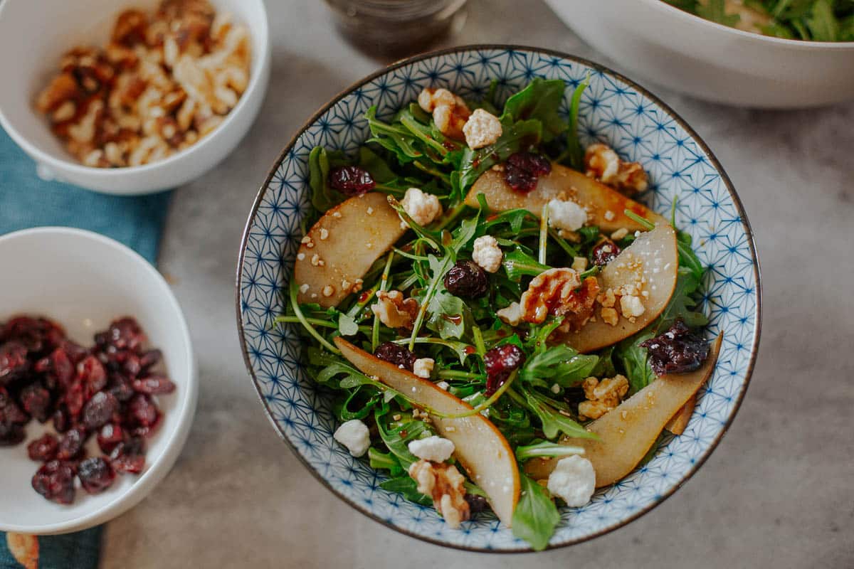 pear goat cheese salad in a bowl