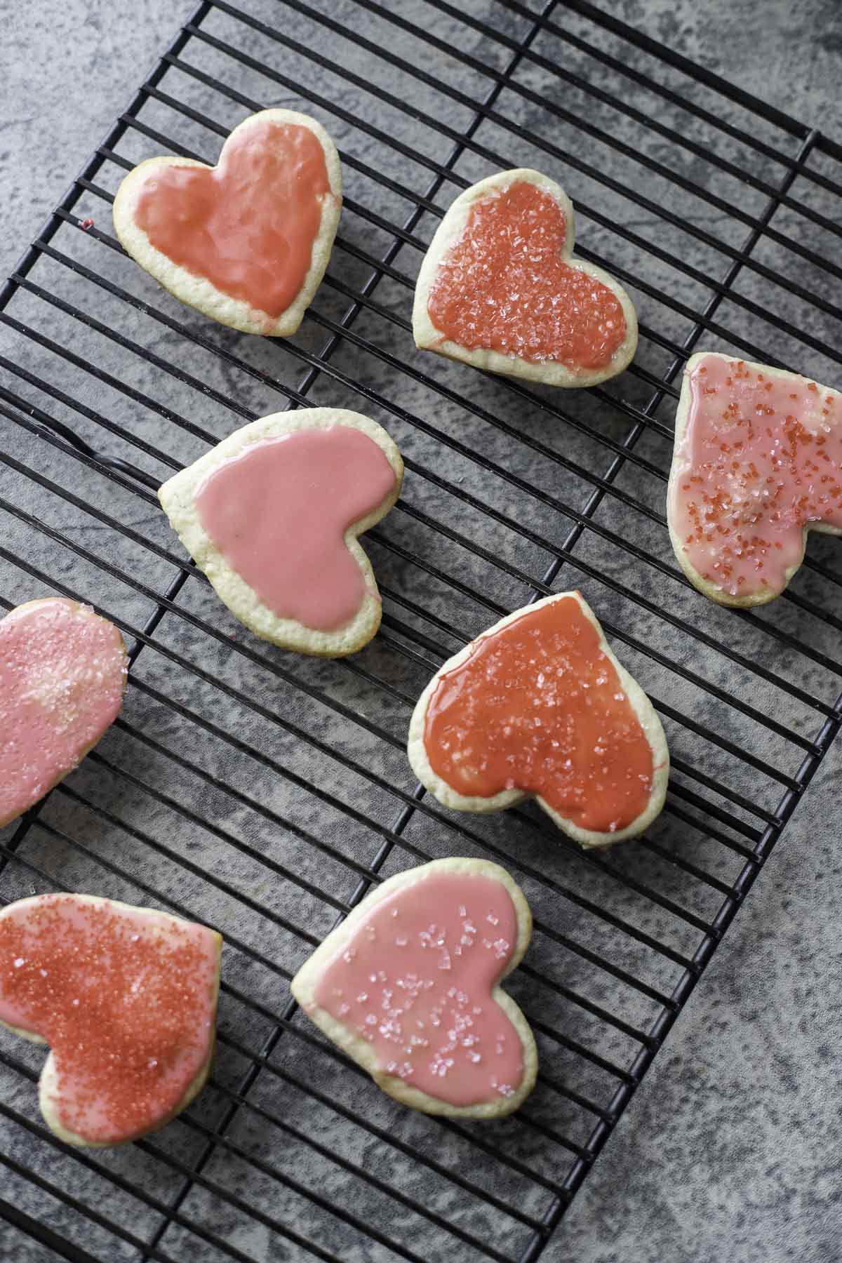 heart shaped cookies with red and pink glaze