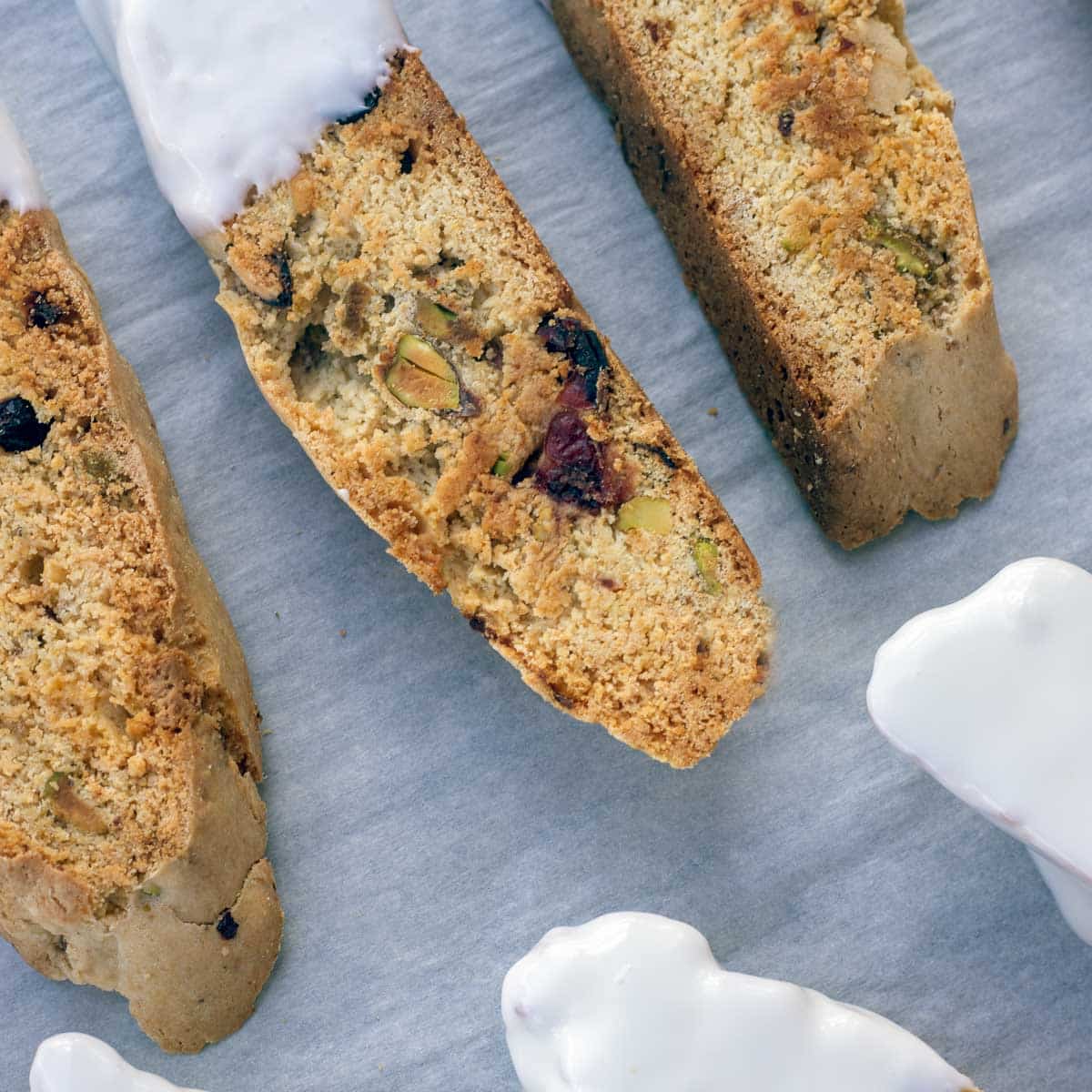 pistachio biscotti covered in white chocolate