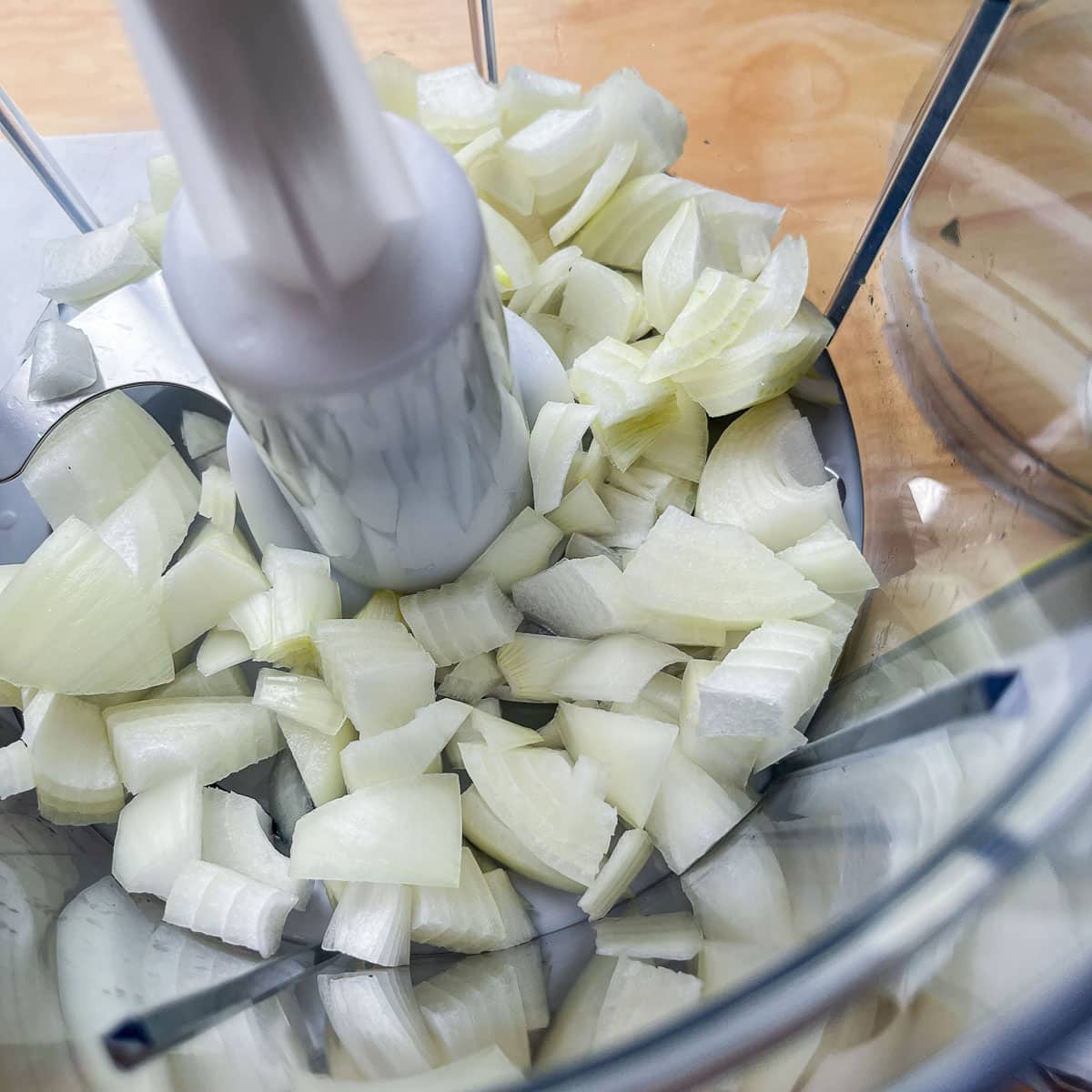 chopped onion in a food processor