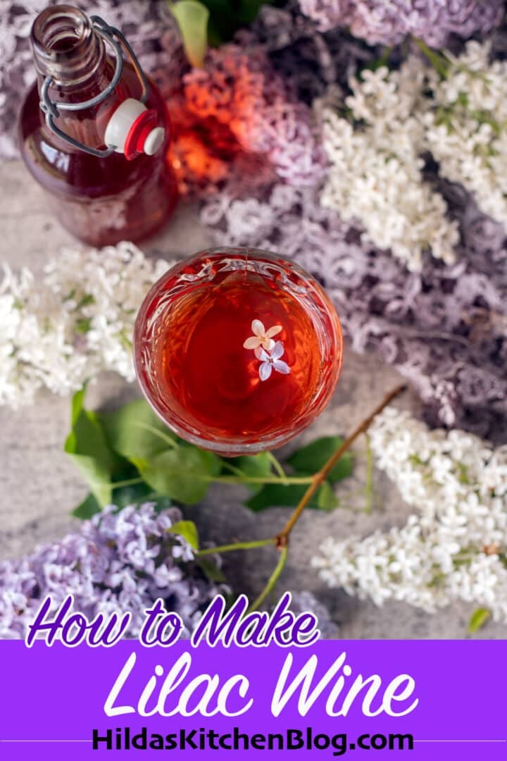 lilac wine with lilacs around it