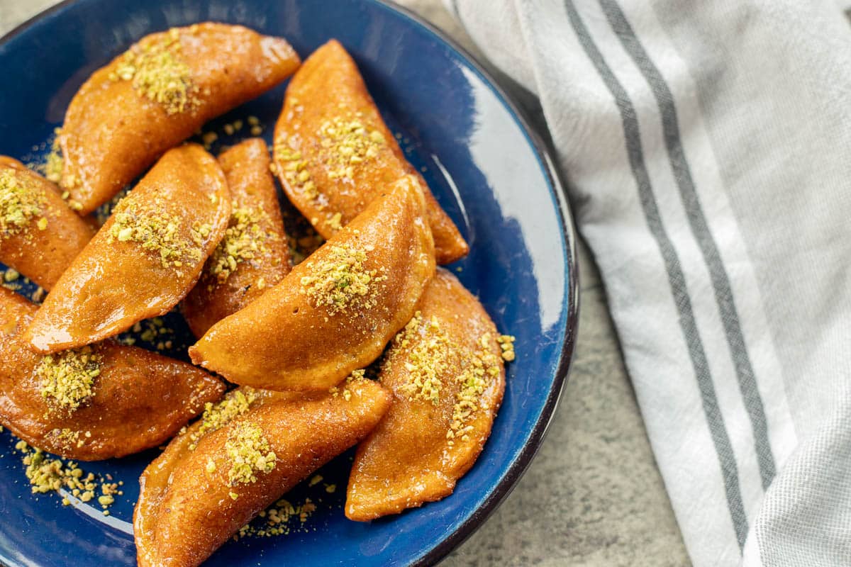 a plate of Atayef middle Eastern pastries 