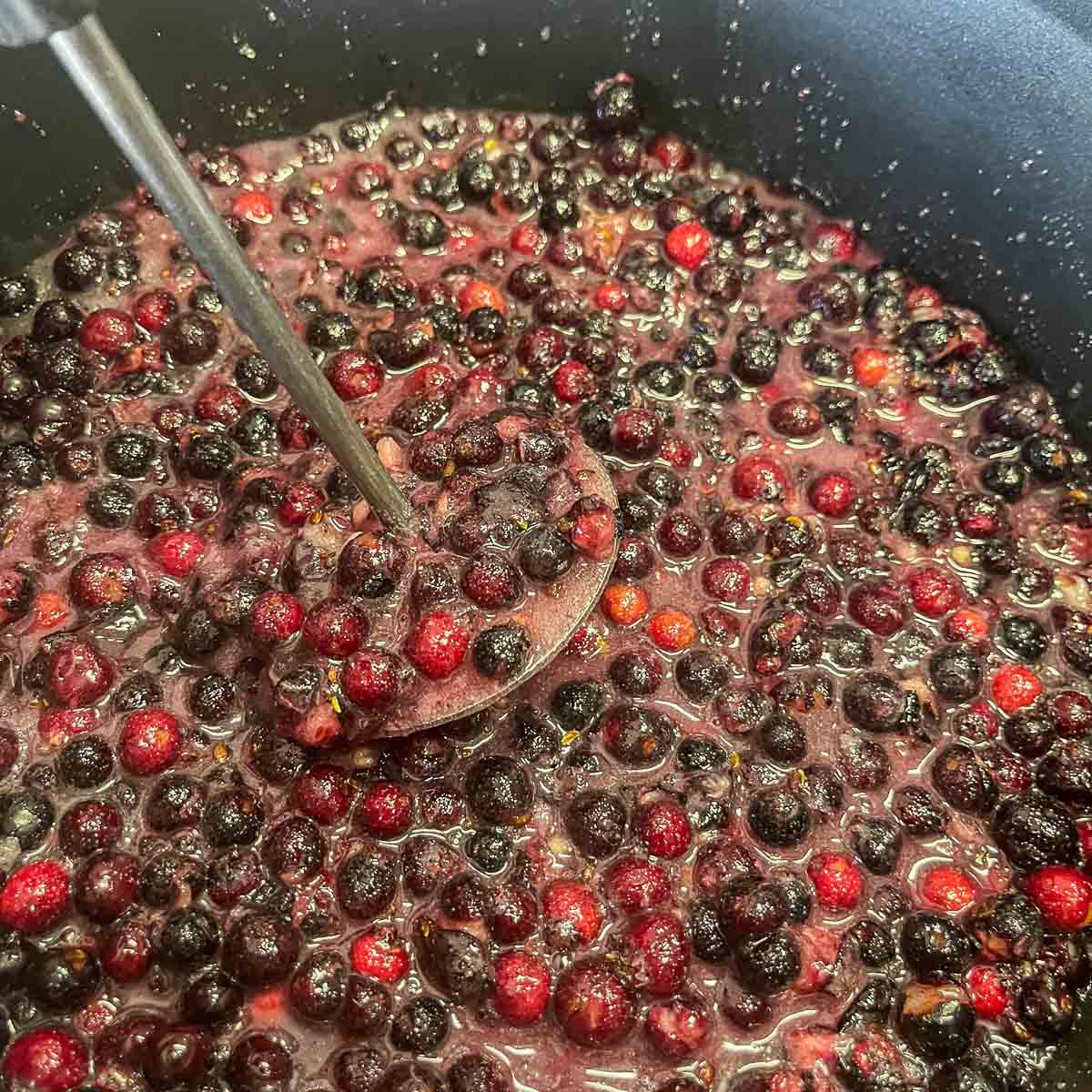 saskatoon berries being mashed