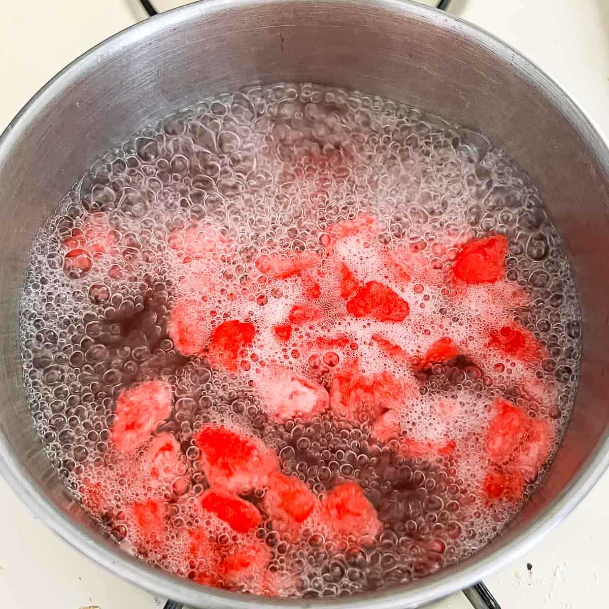 water chestnuts being boiled in a pot