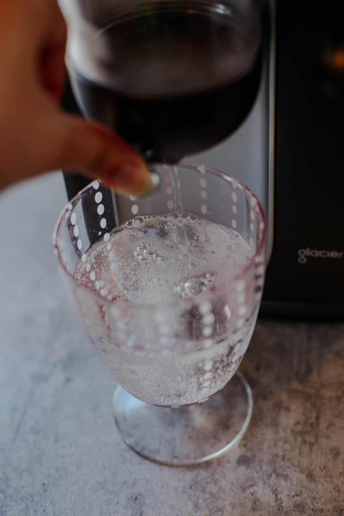 soda water being poured out of SPARKIN