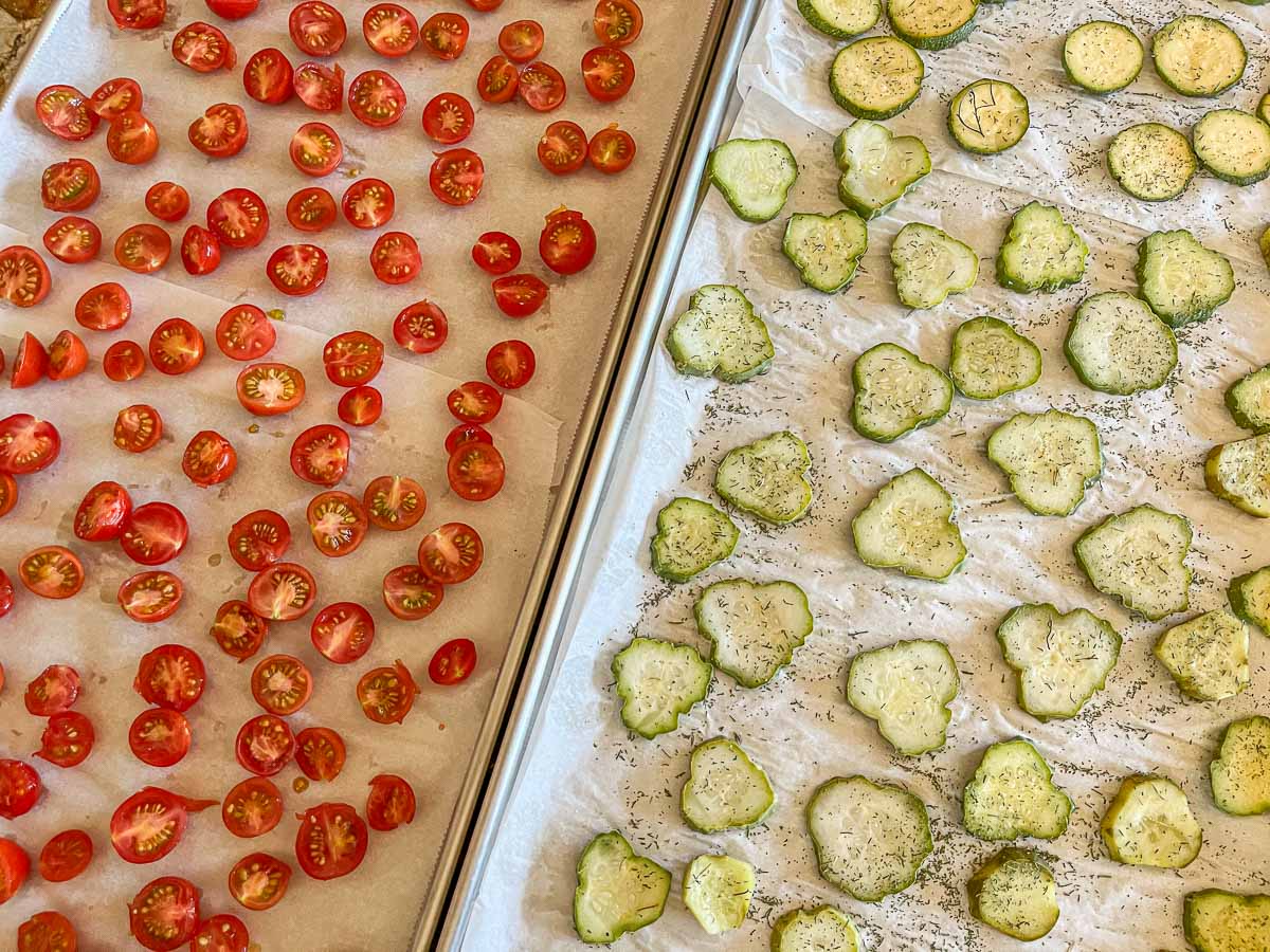 tomatoes and cucumber slices on trays