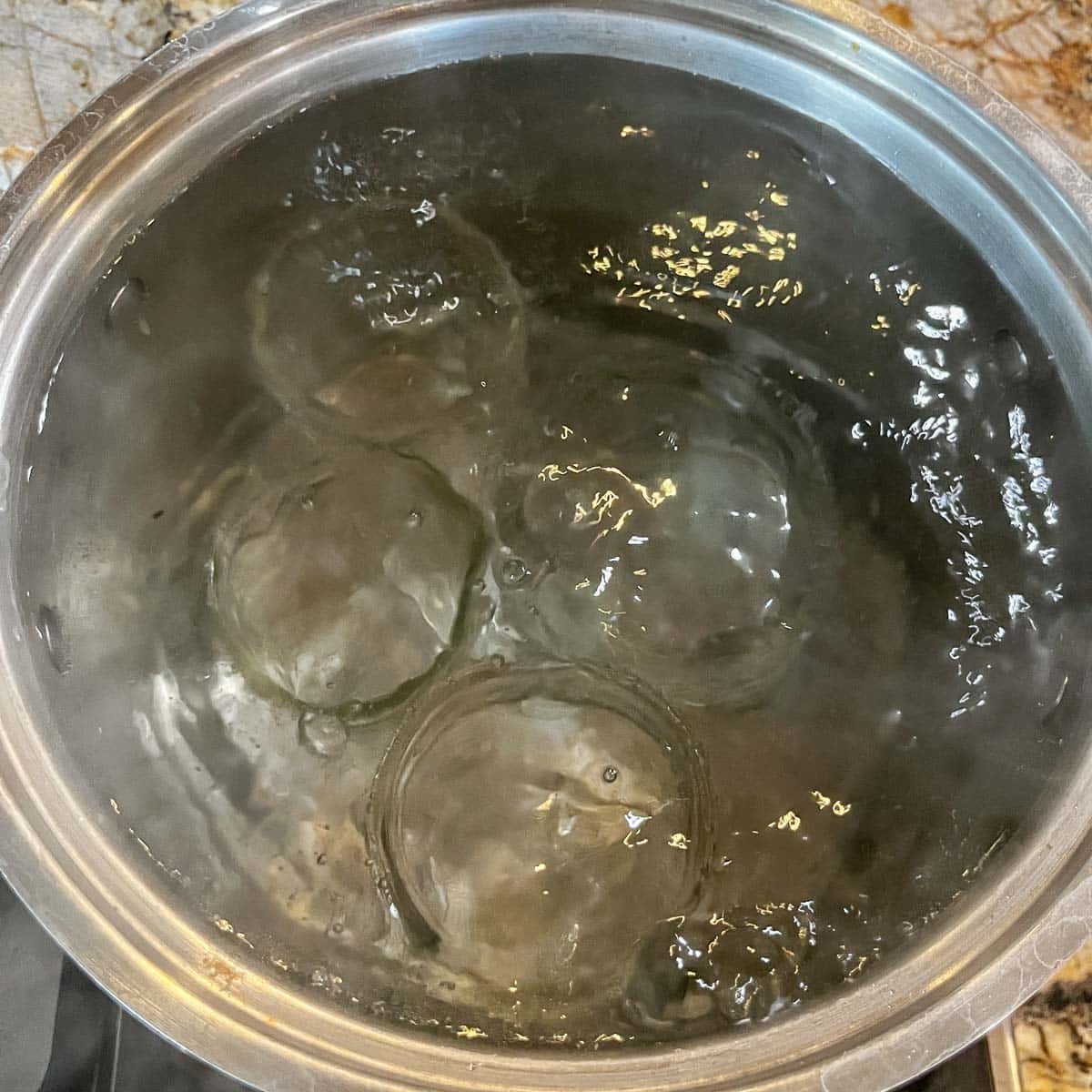 canning mason jars in boiling water