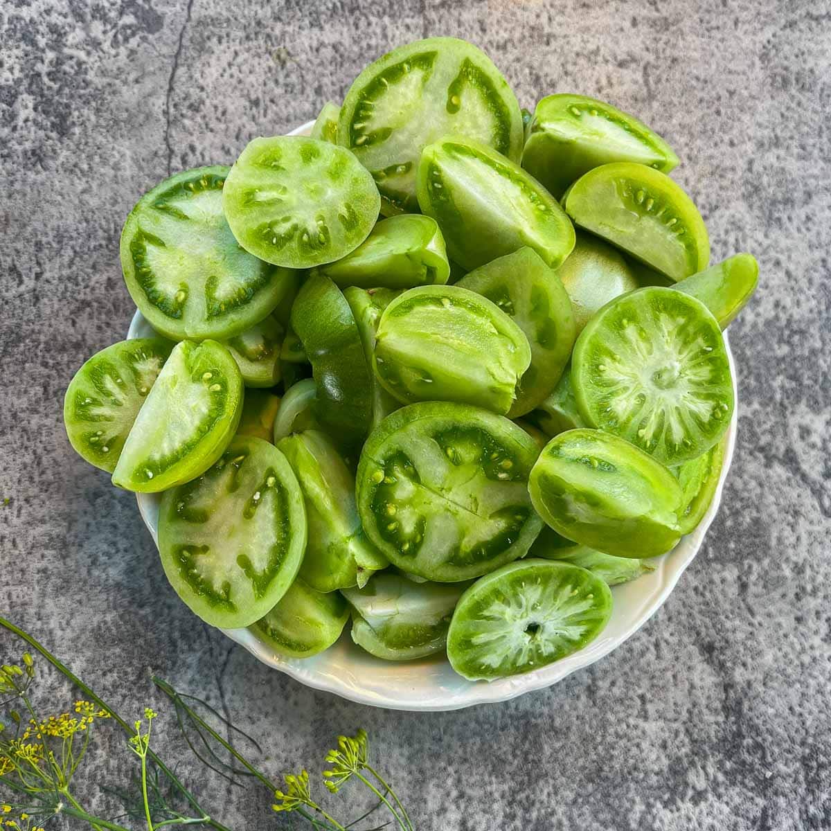 sliced green tomatoes in a bowl