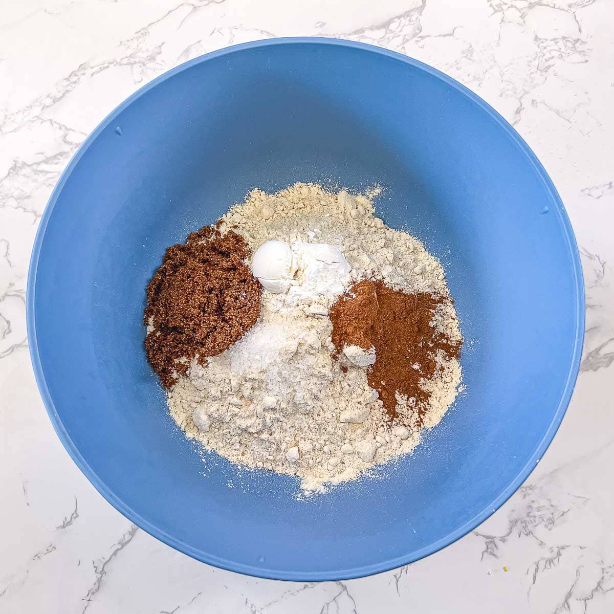 dry ingredients in blue bowl (unmixed)