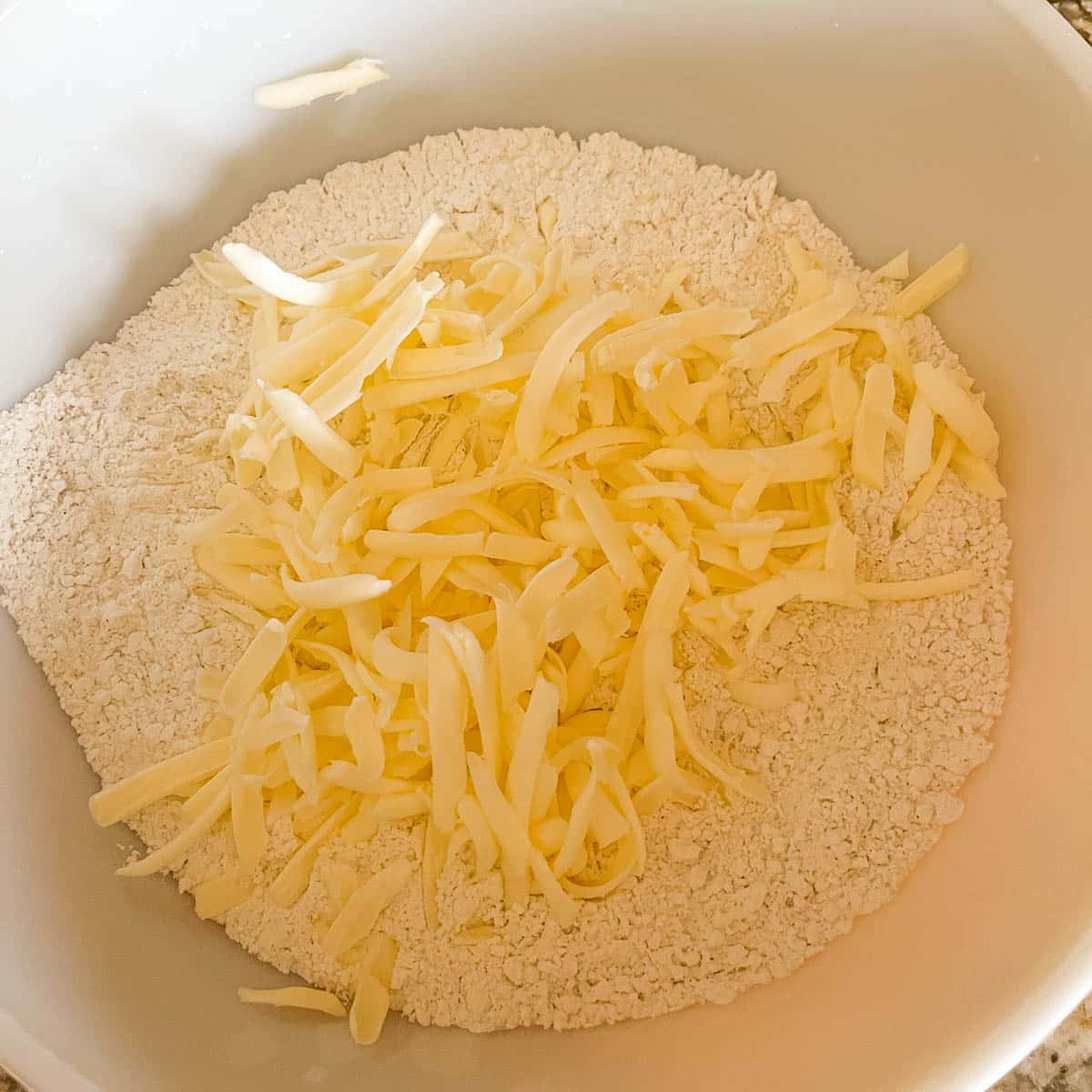 scone flour mixture with shredded butter