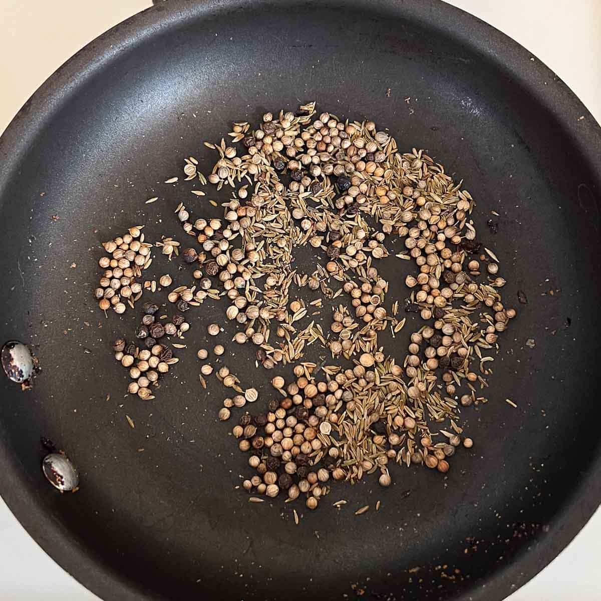 seeds toasting in pan