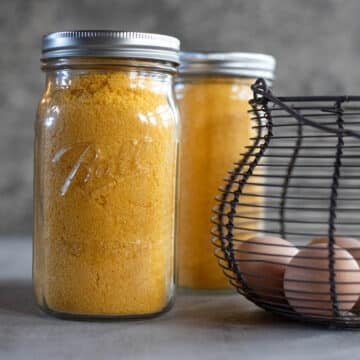 freeze dried eggs in jars with more eggs in a basket