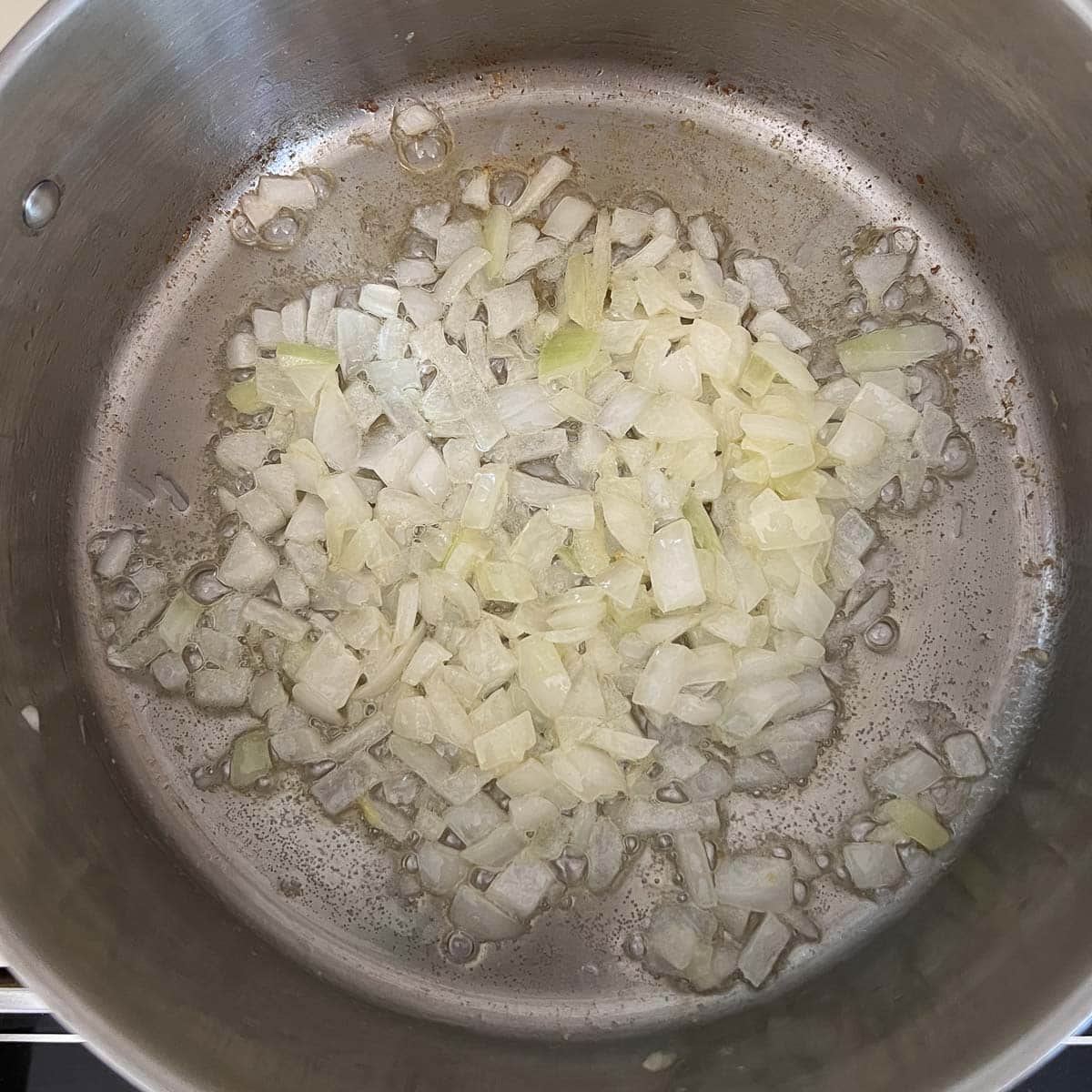 diced onions sauteeing in butter