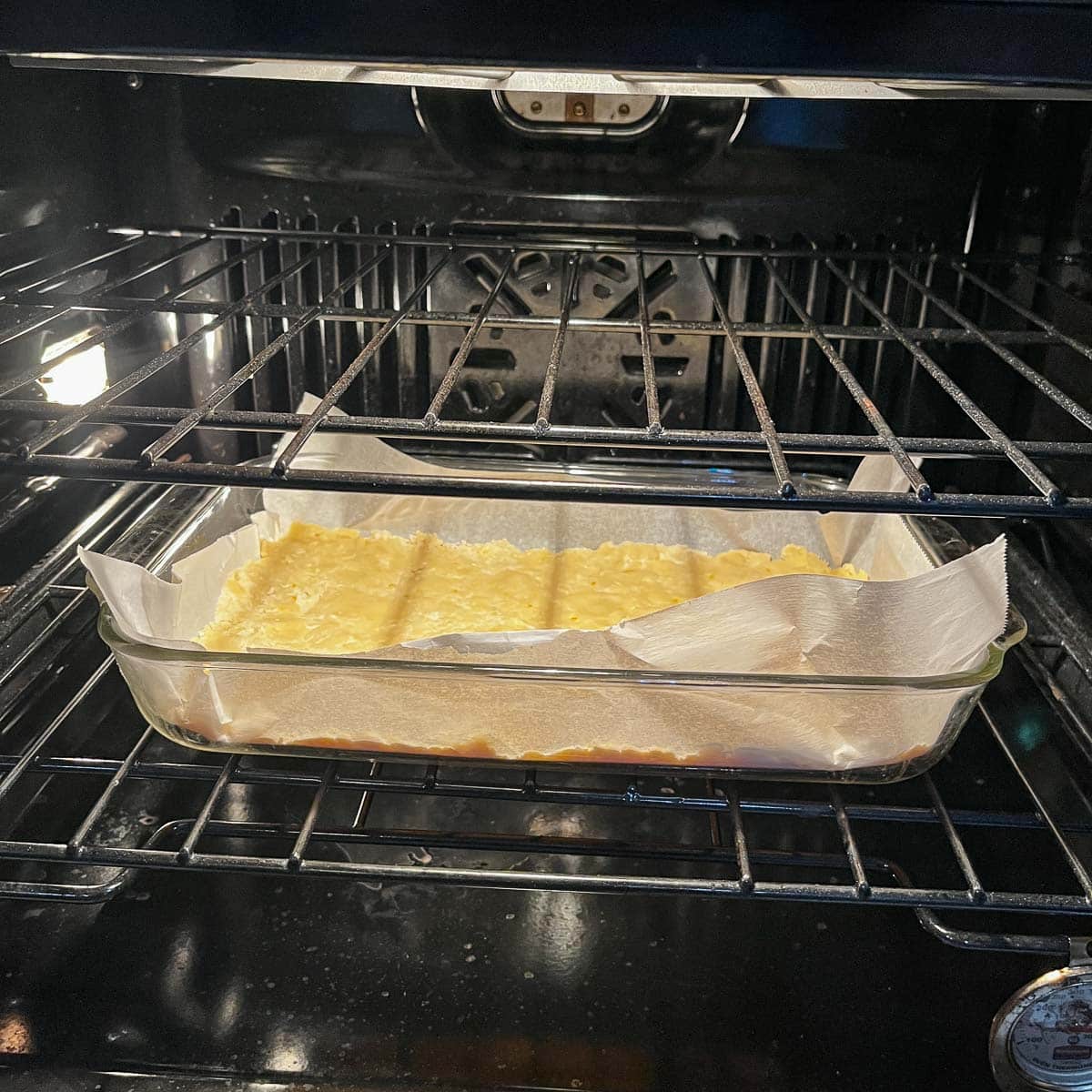 lemon bars shortbread crust baking in the oven