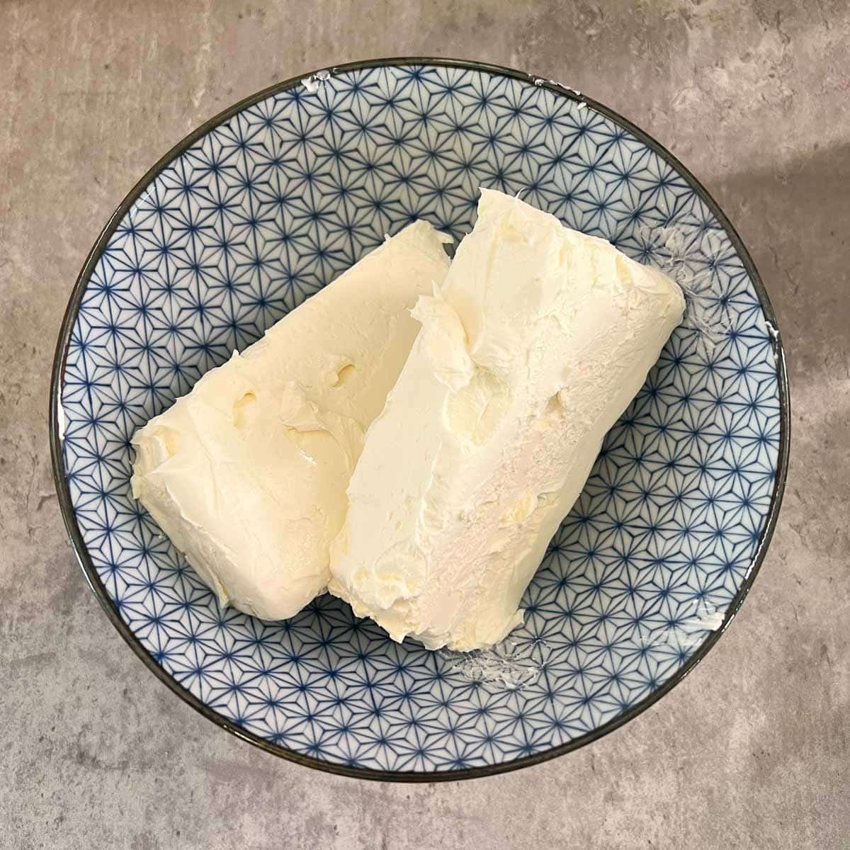 cream cheese blocks in bowl