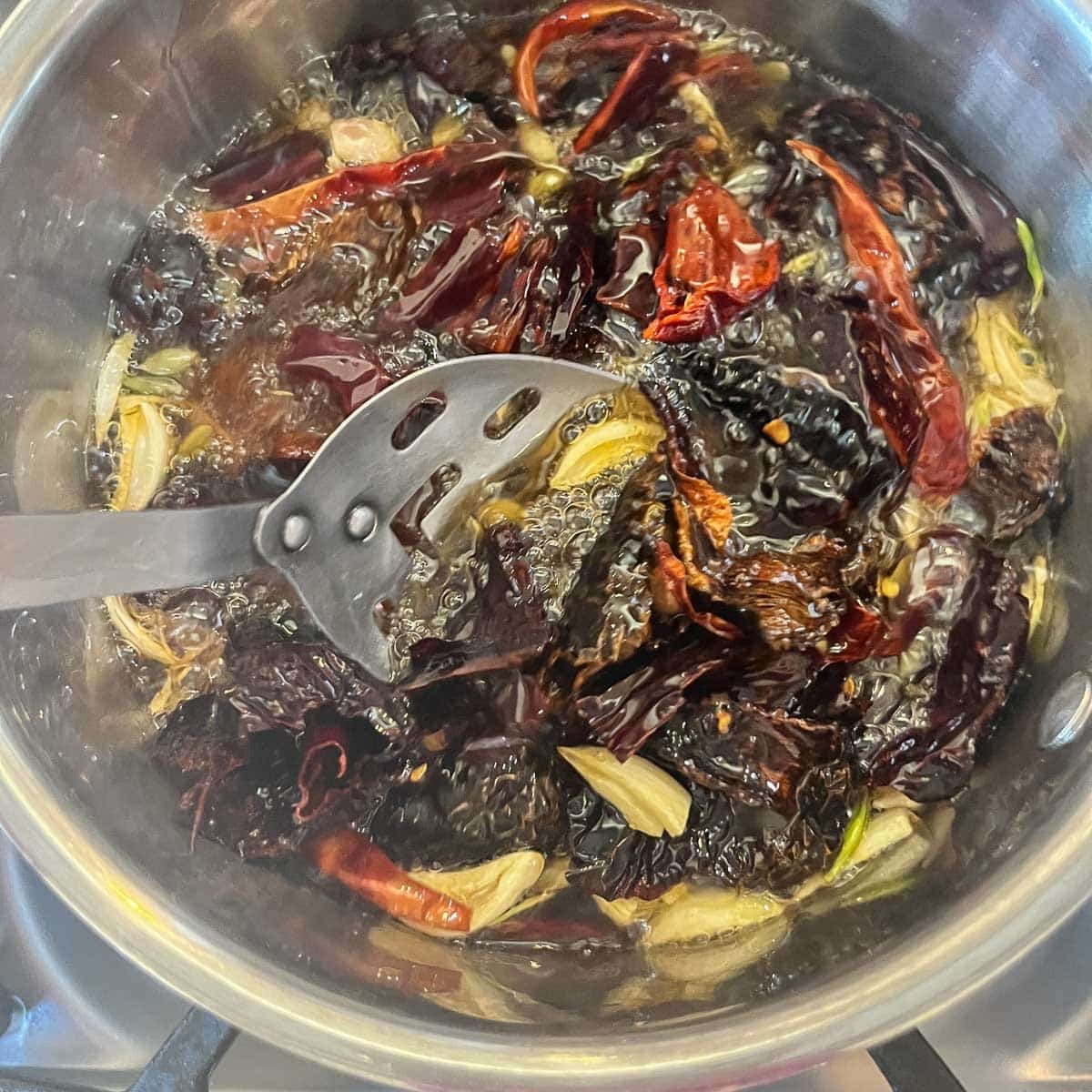 Salsa Macha ingredients in a pot
