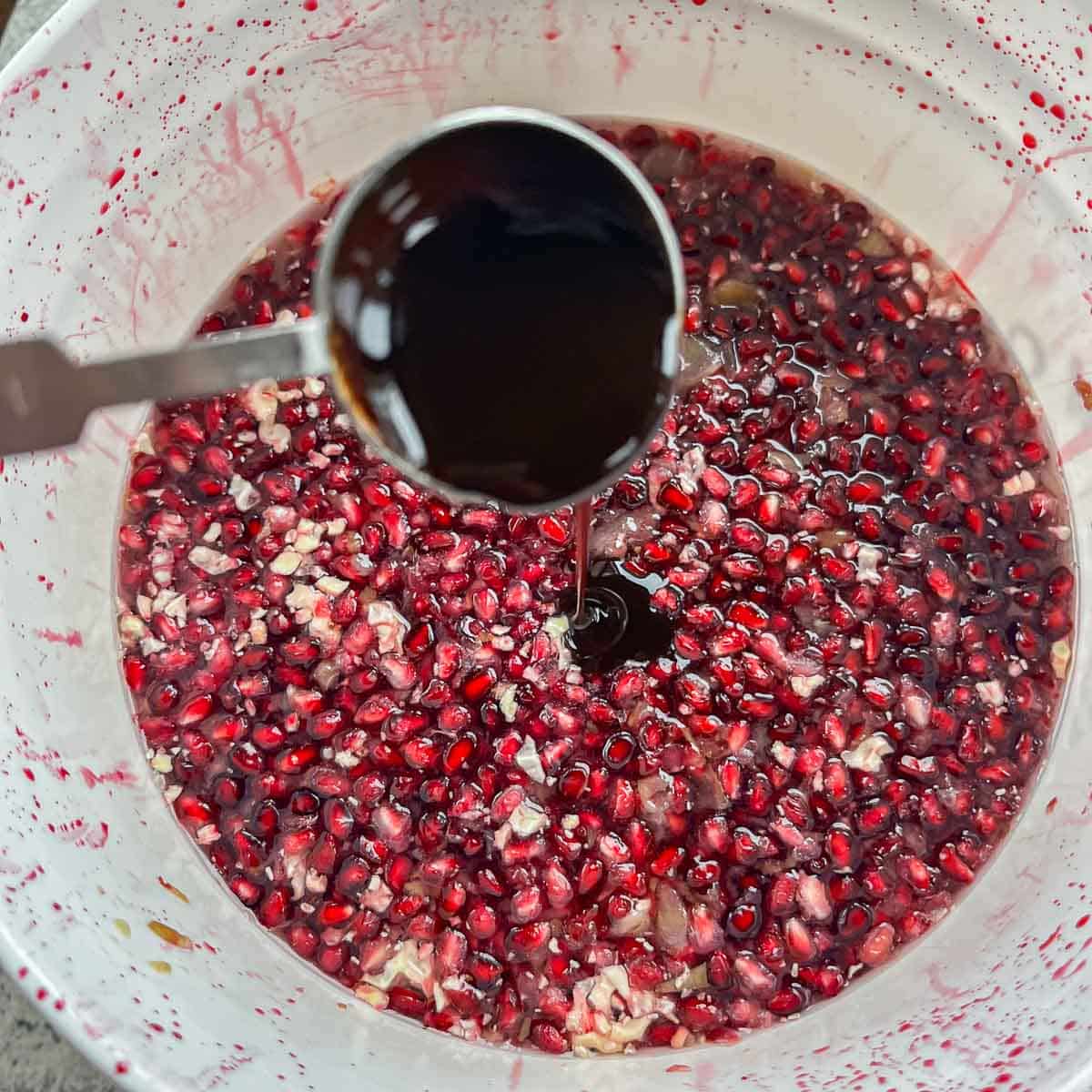 adding pomegranate syrup to wine must