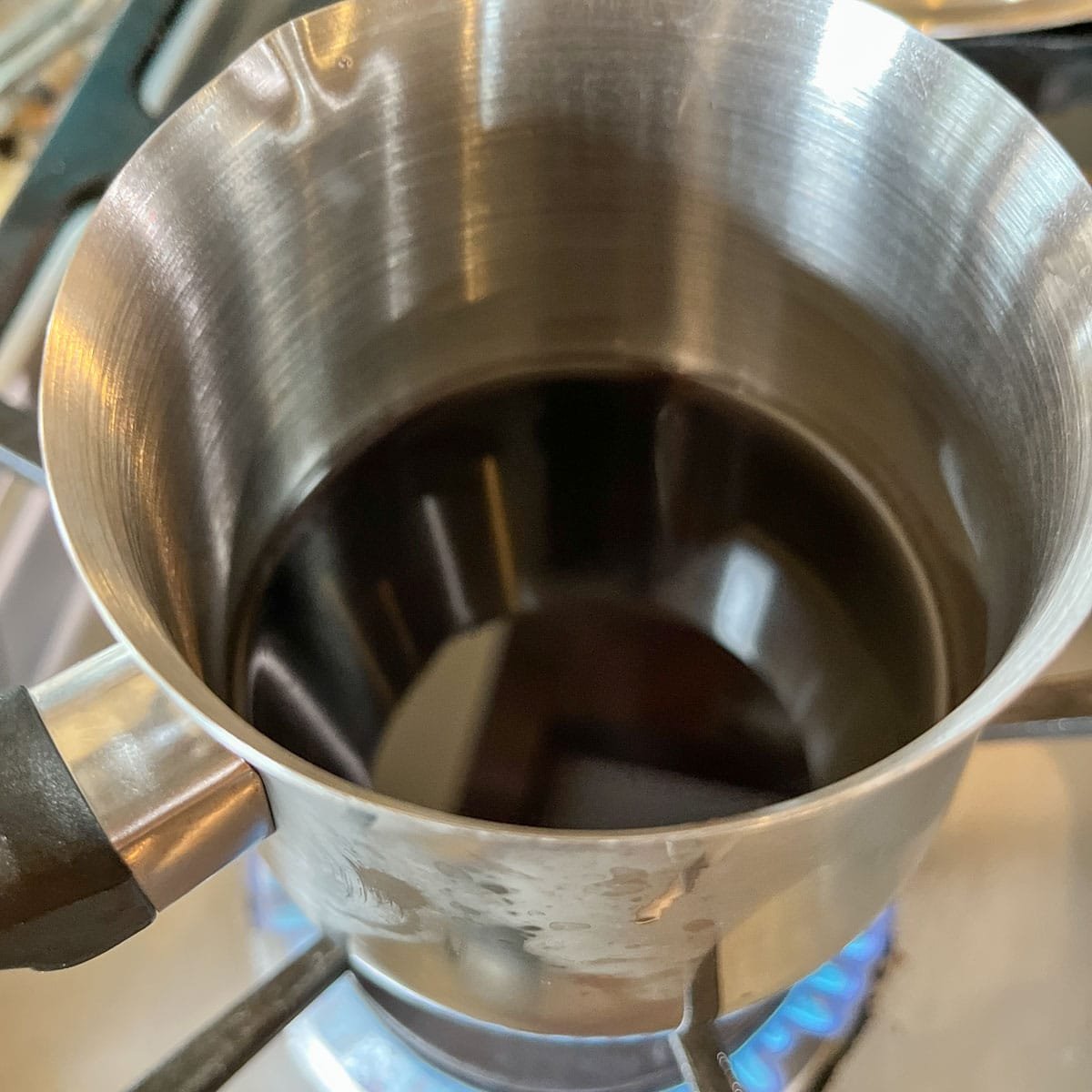 balm of gilead infusing in a small saucepan.