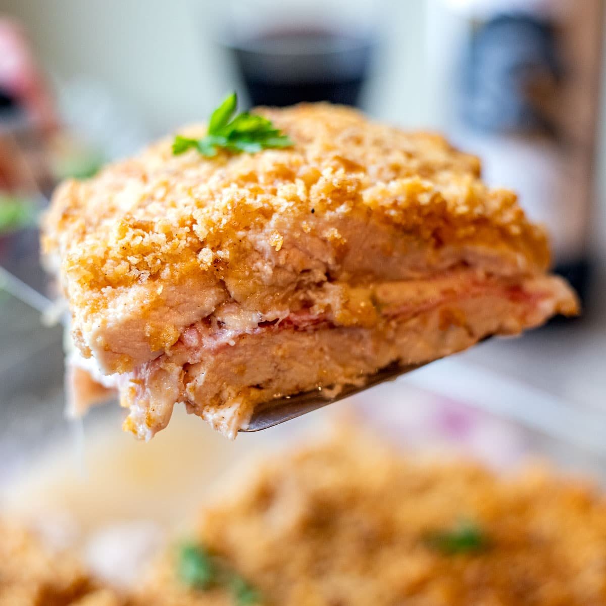 chicken cordon bleu casserole being served