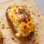 air fryer twice baked potato on cutting board