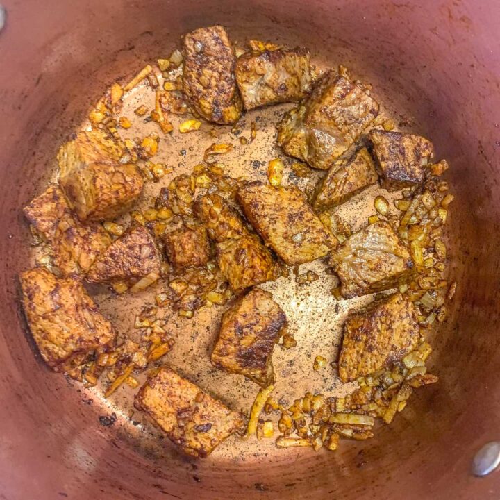 cubed meat in a pot