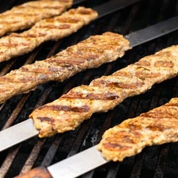 ground chicken kofta kebab being grilled