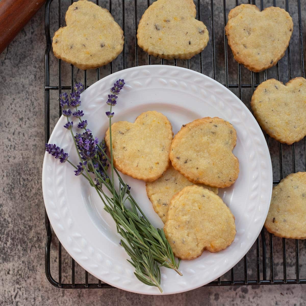 orange lavender shortbread cookies on a white plate