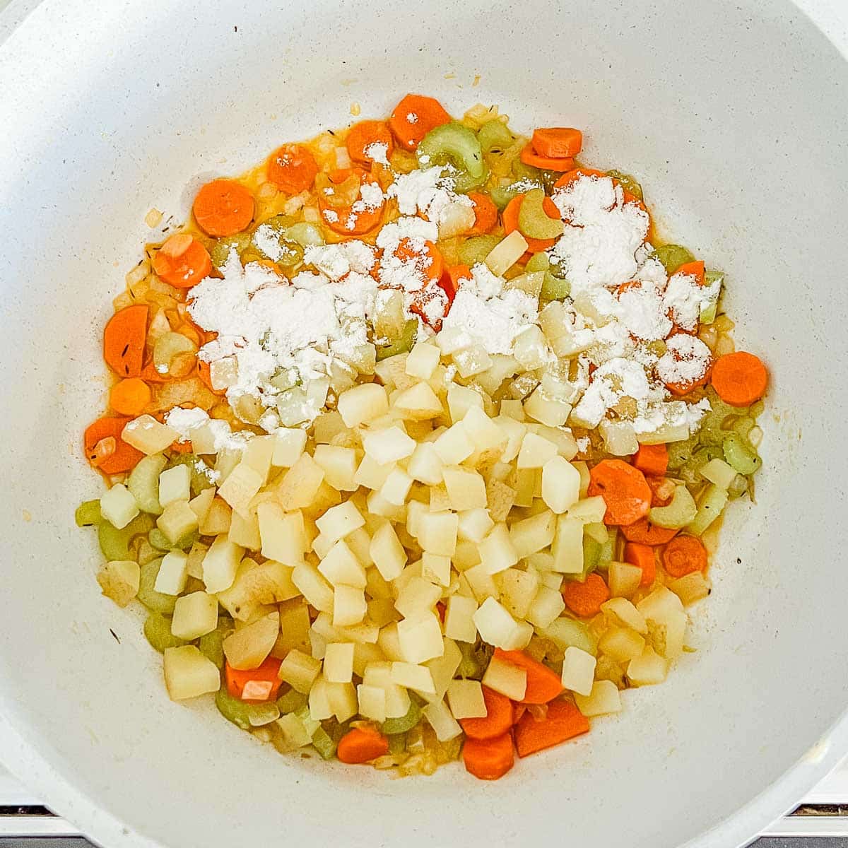 chopped veggies, melted butter, and flour in pot