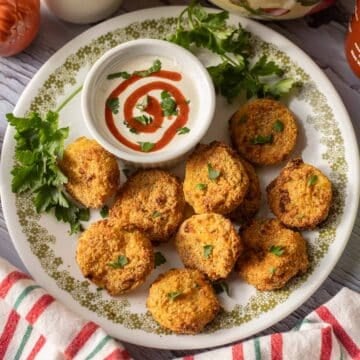 air fried green tomatoes and ranch dressing garnished with parsley