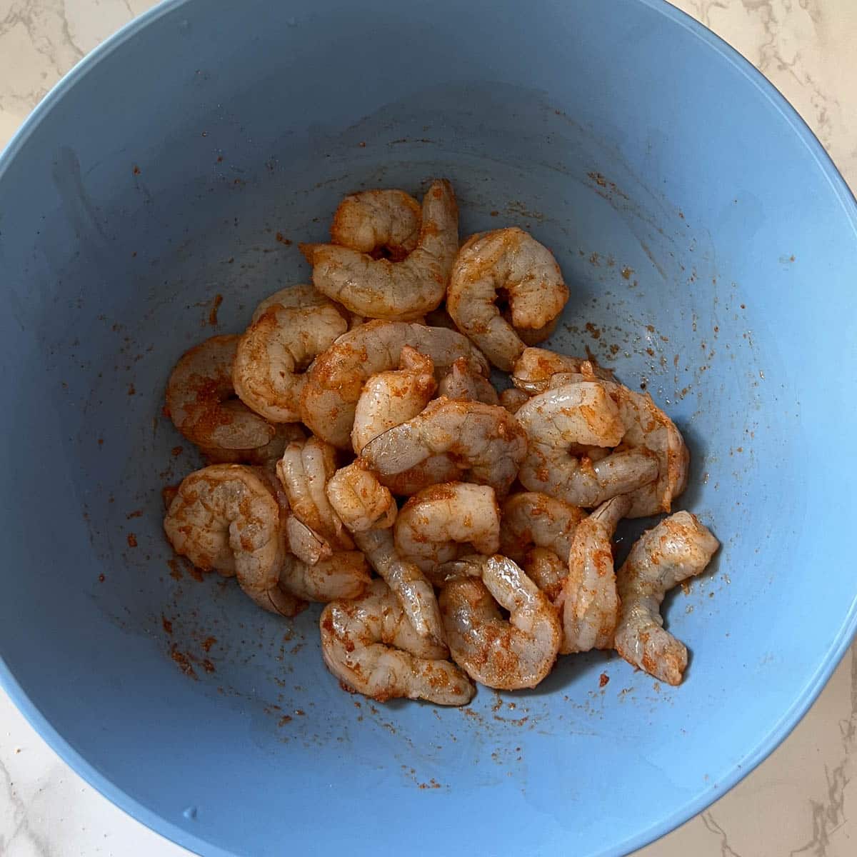 seasoned raw shrimp in bowl